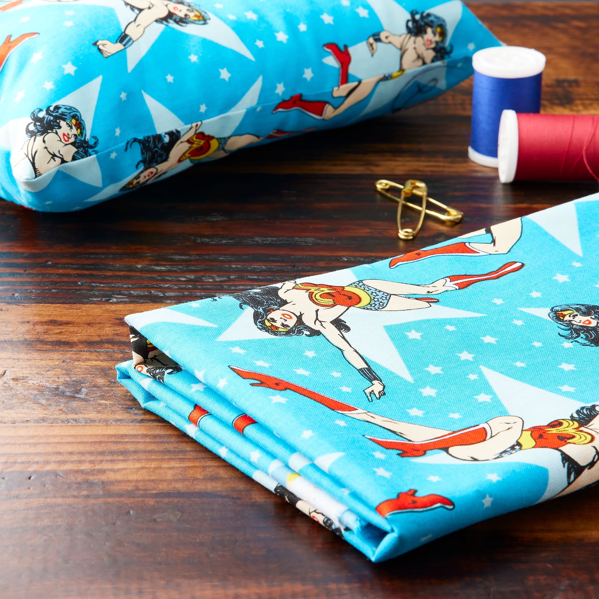 Camelot® Fabrics Wonder Woman™ & Stars on Topaz Cotton Fabric